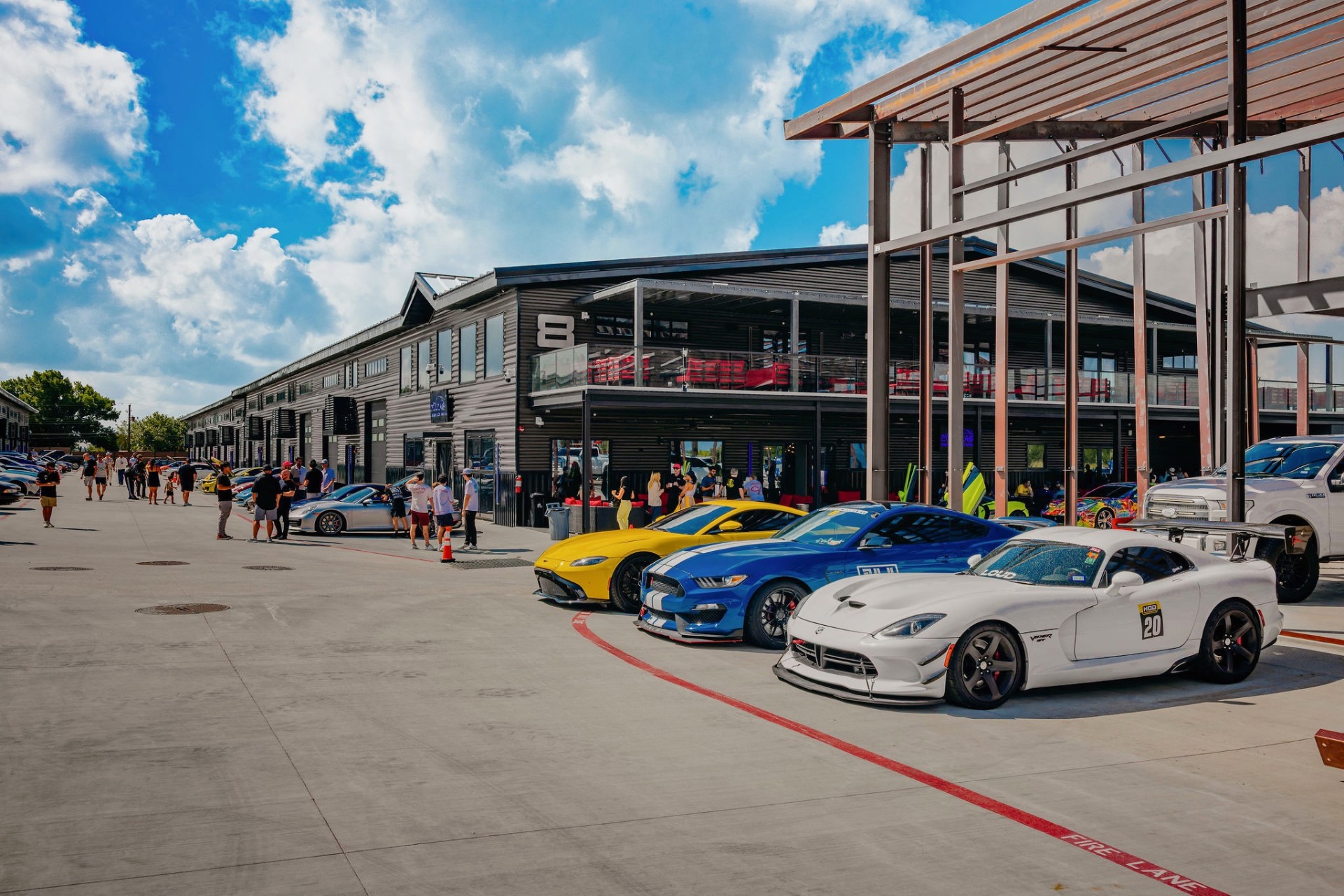 Row of Viper, Mustang and Aston Martin lined up at a GOTA event